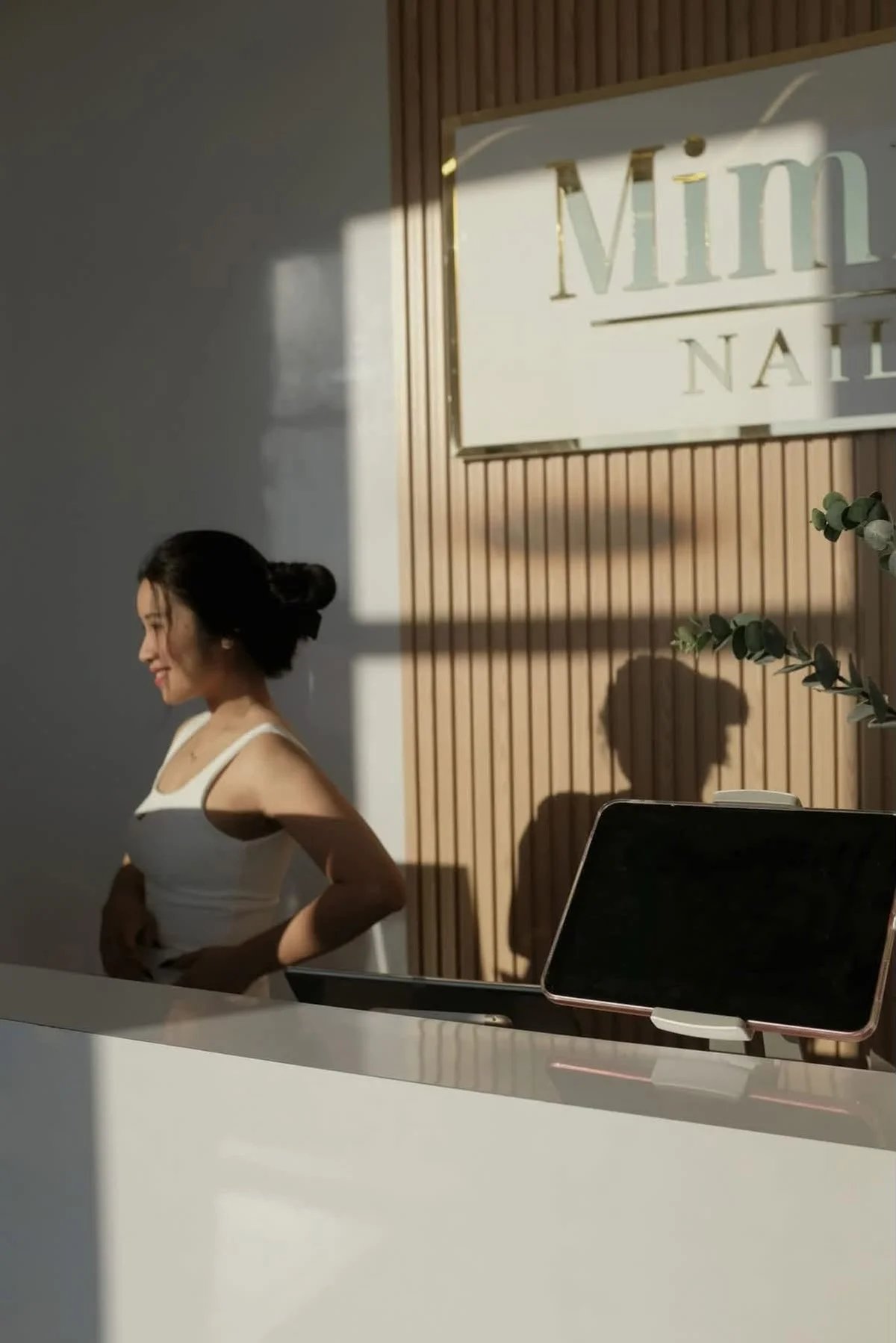 Mimi Mai's reception desk in warm afternoon light
